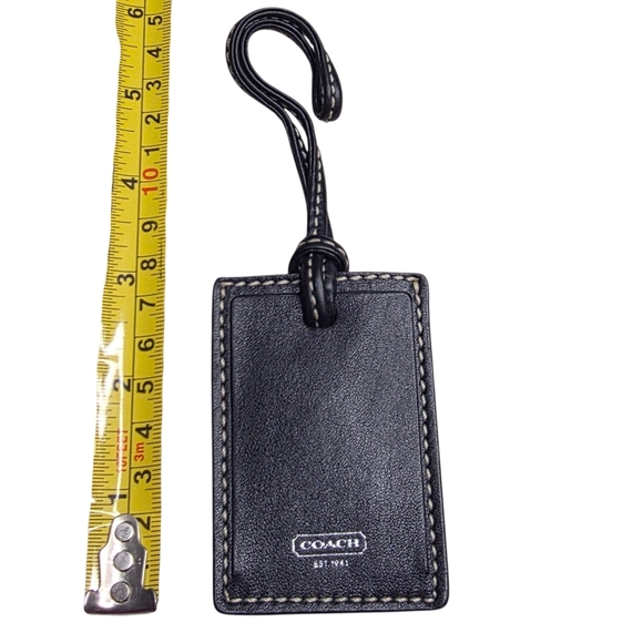 Coach Handbags - Coach Black Leather Tag with White Stitching